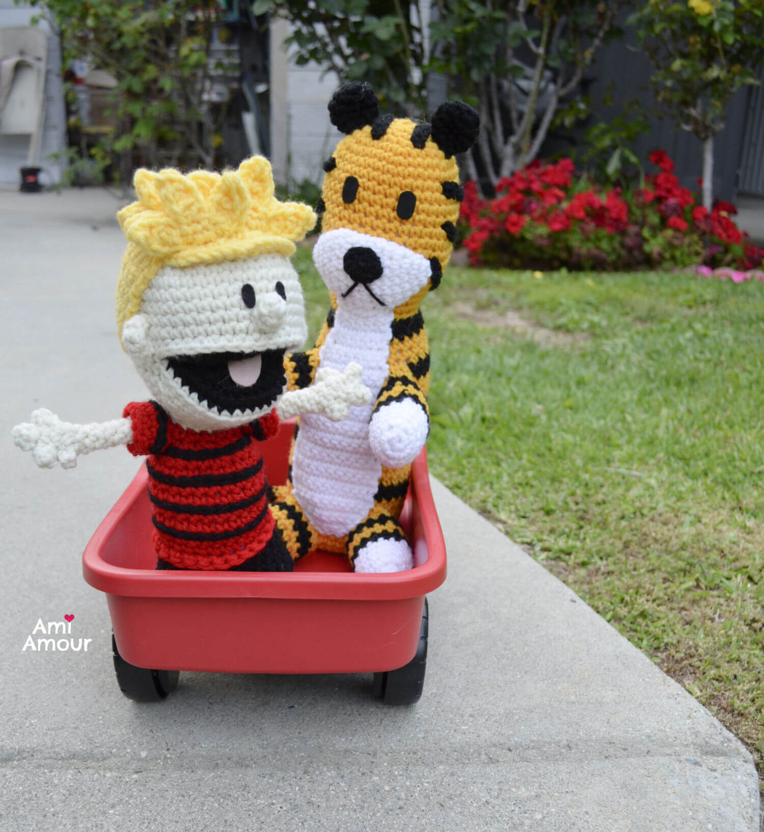 crochet Calvin and Hobbes in their red wagon